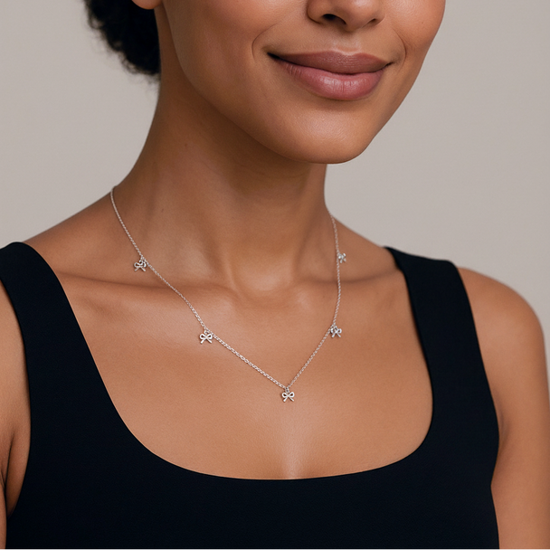 Vintage bow necklace in gold or silver. Stainless steel flat chain, delicate design. Perfect for everyday elegance & romantic style.