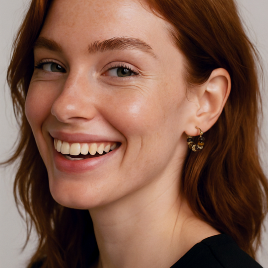 Boho tiger eye beaded hoop earrings with gold accents & sterling silver posts. Lightweight, natural stone design. Perfect for everyday elegance.