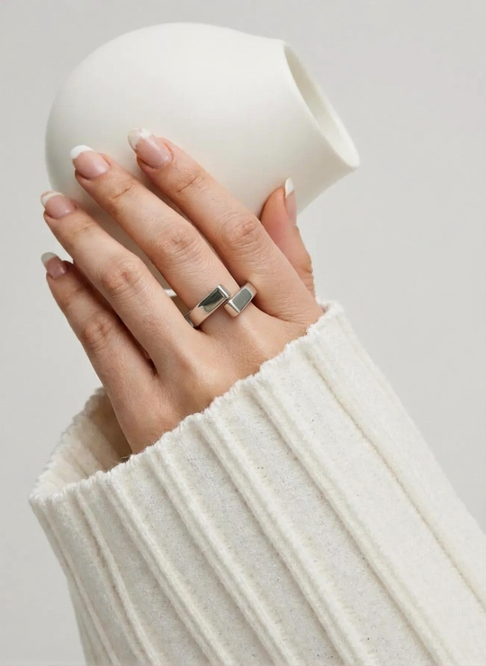 925 sterling silver open ring with geometric double-layer design. Adjustable fit, hypoallergenic. Modern minimalist statement piece perfect for everyday wear.
