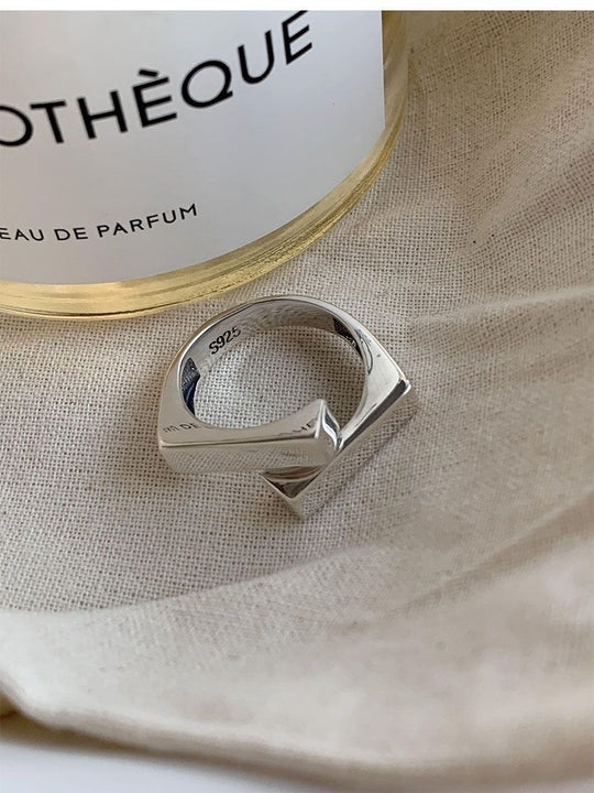925 sterling silver open ring with geometric double-layer design. Adjustable fit, hypoallergenic. Modern minimalist statement piece perfect for everyday wear.