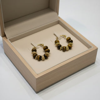 Boho tiger eye beaded hoop earrings with gold accents & sterling silver posts. Lightweight, natural stone design. Perfect for everyday elegance.