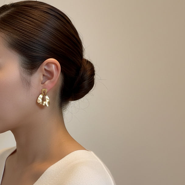 Artful gold drop earrings with sculpted organic links. Lightweight matte finish. Perfect for everyday elegance & modern style.