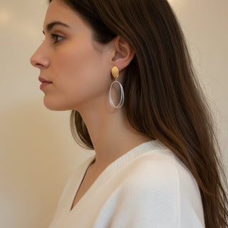 Boho gold teardrop earrings with layered multi-ring design. Lightweight, sculptural style. Perfect for everyday elegance & festival vibes.