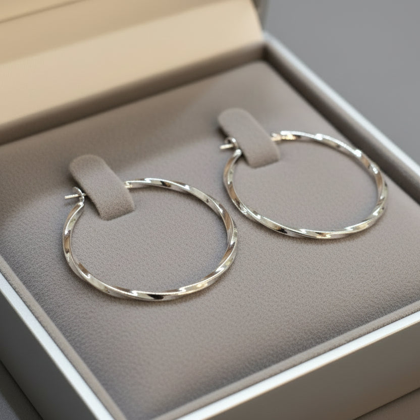 Modern textured hoop earrings in gold or silver with hammered finish. Lightweight medium hoops. Perfect for everyday elegance & minimalist style.