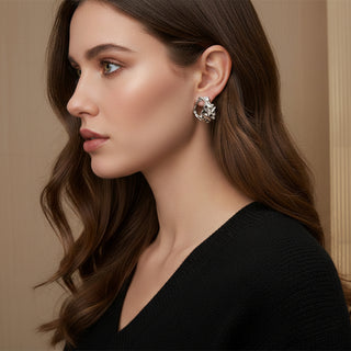 Modern textured silver hoop earrings with hammered finish. Lightweight medium hoops. Perfect for everyday elegance & office style.