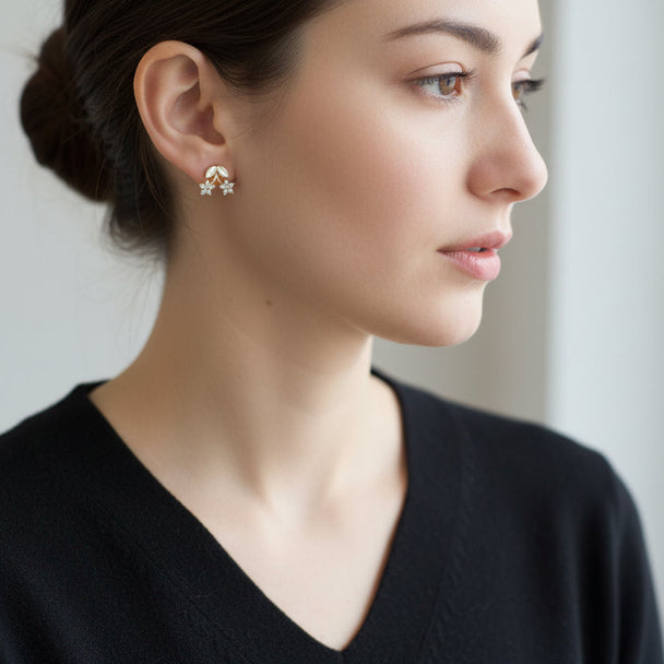 Delicate gold flower stud earrings with opal petals & cubic zirconia. Lightweight, romantic design. Perfect for everyday elegance & feminine style.