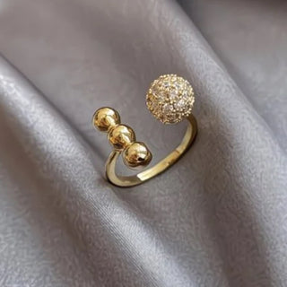 Modern 14K gold plated open ring with sphere design & micro-set zircon. Adjustable fit, stackable. Perfect for minimalist everyday style.