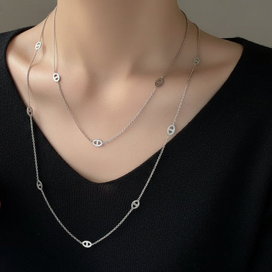 Modern layered disc chain necklace in gold or silver. 120cm long, adjustable fit. Perfect for everyday elegance & minimalist layering style.