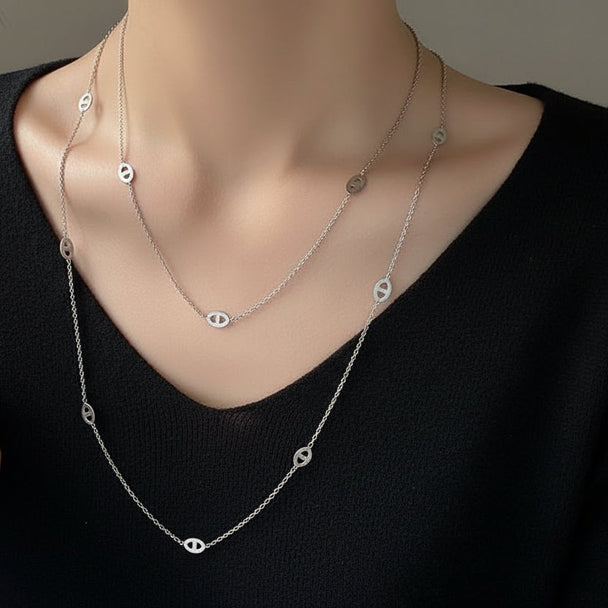 Modern layered disc chain necklace in gold or silver. 120cm long, adjustable fit. Perfect for everyday elegance & minimalist layering style.
