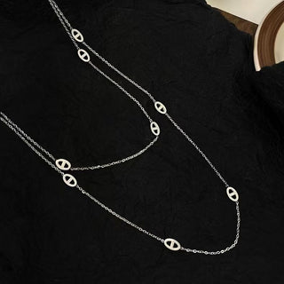 Modern layered disc chain necklace in gold or silver. 120cm long, adjustable fit. Perfect for everyday elegance & minimalist layering style.