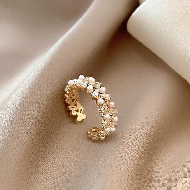 Elegant gold open ring with freshwater pearls & crystals. Adjustable fit, French-inspired design. Perfect for office wear & everyday elegance.