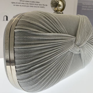 Elegant pleated evening clutch with pearl clasp. Black, silver & gold options. Dual chains for versatile wear. Perfect for weddings, galas, cocktail parties & formal events.