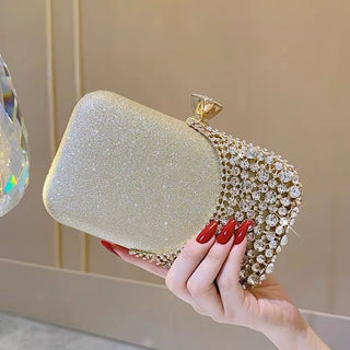 Glamorous rhinestone evening clutch with glitter PU finish. Crystal clasp & dual chains. Black, silver & gold options. Perfect for weddings, proms & cocktail parties.