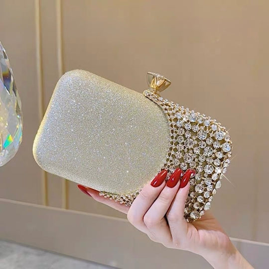 Glamorous rhinestone evening clutch with glitter PU finish. Crystal clasp & dual chains. Black, silver & gold options. Perfect for weddings, proms & cocktail parties.