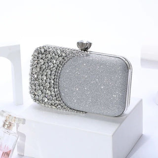 Glamorous rhinestone evening clutch with glitter PU finish. Crystal clasp & dual chains. Black, silver & gold options. Perfect for weddings, proms & cocktail parties.