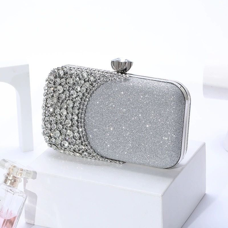 Glamorous rhinestone evening clutch with glitter PU finish. Crystal clasp & dual chains. Black, silver & gold options. Perfect for weddings, proms & cocktail parties.