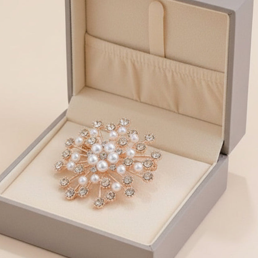 Elegant rose gold snowflake brooch with rhinestones & pearls. Versatile pin for blazers, coats, scarves & dresses. Made in Korea. Perfect gift for weddings & holidays.