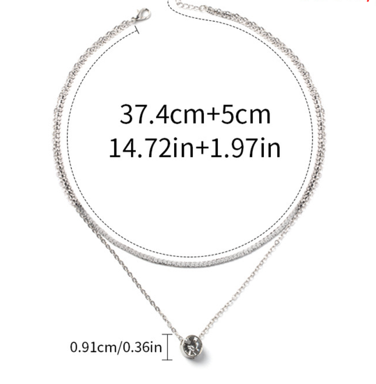 Elegant silver-plated double-layer necklace. Lightweight, delicate chains. Perfect for layering over sweaters & everyday elegance.