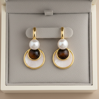 Elegant gold drop earrings with brown stone & white pearl inlay. Layered design, lightweight. Perfect for everyday elegance & special occasions.