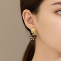 Gold and brown stone floral drop earrings 