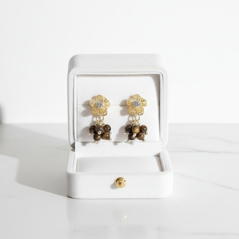 Elegant gold floral drop earrings with brown stone center. 5cm length, lightweight design. Perfect for boho style & everyday elegance.