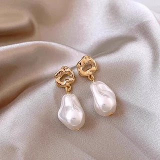 Elegant gold knot earrings with teardrop pearl drops. Lightweight, romantic design. Perfect for weddings, brunch & everyday elegance.