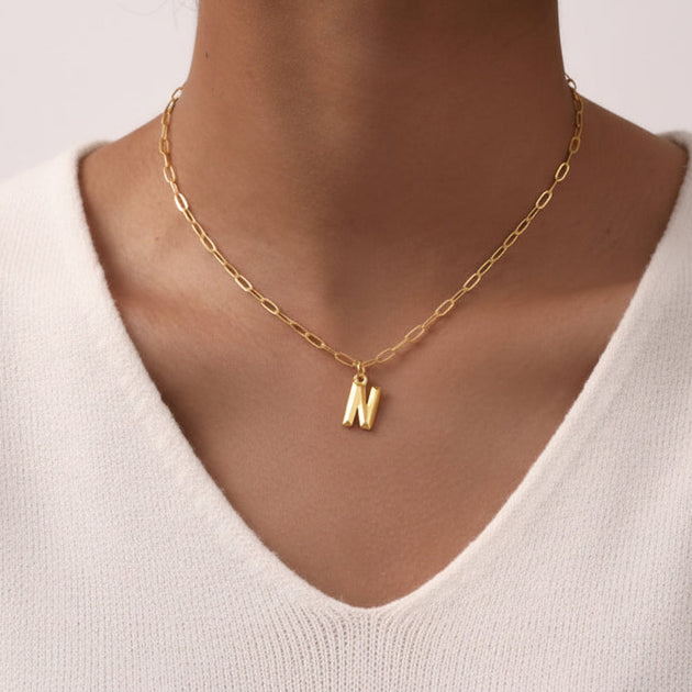 Personalized gold initial necklace with 3D letter pendant. Stainless steel, A-Z available. Perfect for everyday elegance & meaningful gifts.