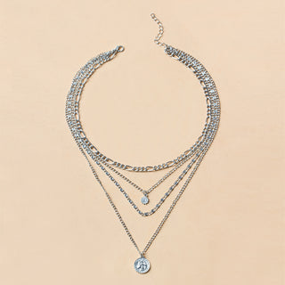 Elegant long layered chain necklace in gold or silver. Multi-strand design. Perfect for layering over sweaters & everyday elegance.