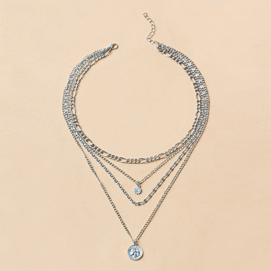 Elegant long layered chain necklace in gold or silver. Multi-strand design. Perfect for layering over sweaters & everyday elegance.