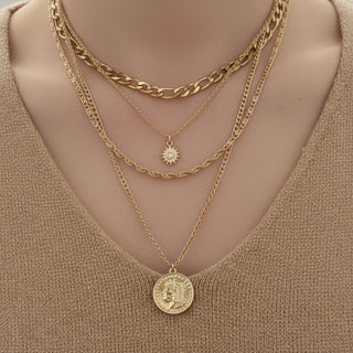 Elegant long layered chain necklace in gold or silver. Multi-strand design. Perfect for layering over sweaters & everyday elegance.