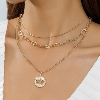 Elegant layered Y-necklace with pendant & multi-strand chains. Gold-plated stainless steel. Perfect for boho style & everyday elegance.
