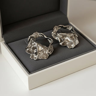 Modern textured silver hoop earrings with hammered finish. Lightweight medium hoops. Perfect for everyday elegance & office style.