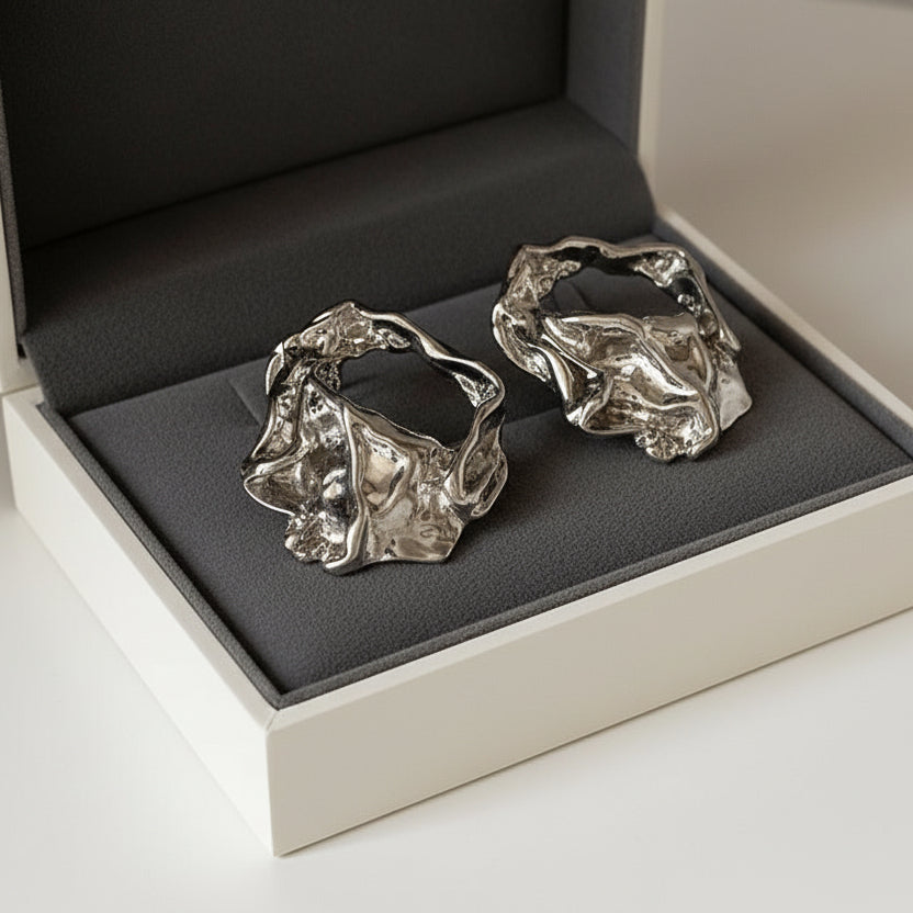 Modern textured silver hoop earrings with hammered finish. Lightweight medium hoops. Perfect for everyday elegance & office style.