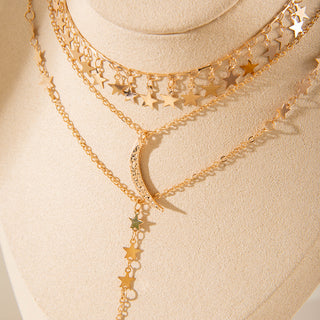 Elegant layered gold Y-necklace with half moon pendant. Delicate multi-chain design. Perfect for boho style & everyday elegance.