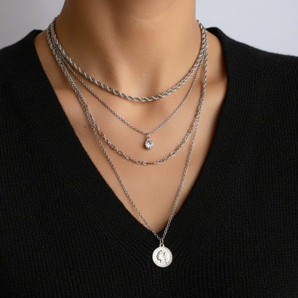Elegant long layered chain necklace in gold or silver. Multi-strand design. Perfect for layering over sweaters & everyday elegance.