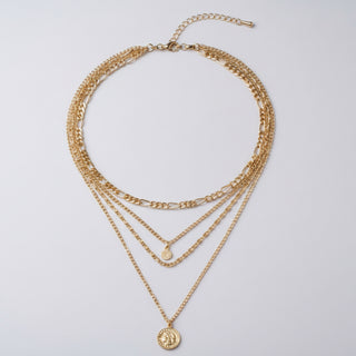 Elegant long layered chain necklace in gold or silver. Multi-strand design. Perfect for layering over sweaters & everyday elegance.
