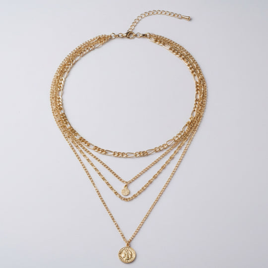 Elegant long layered chain necklace in gold or silver. Multi-strand design. Perfect for layering over sweaters & everyday elegance.