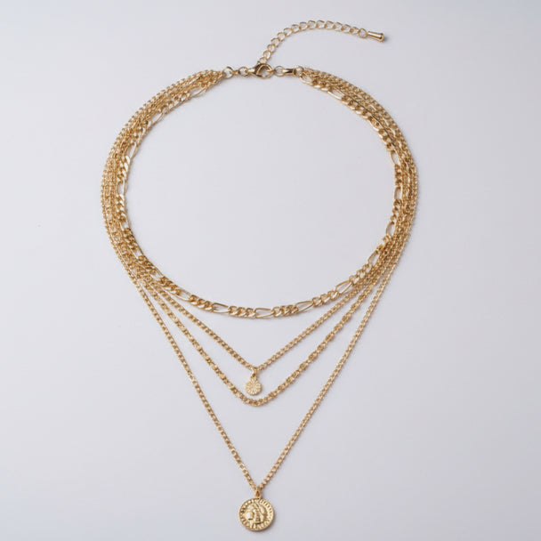Elegant long layered chain necklace in gold or silver. Multi-strand design. Perfect for layering over sweaters & everyday elegance.