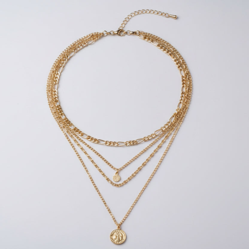 Elegant long layered chain necklace in gold or silver. Multi-strand design. Perfect for layering over sweaters & everyday elegance.
