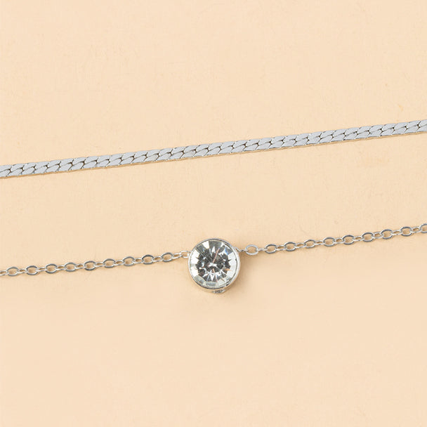 Elegant silver-plated double-layer necklace. Lightweight, delicate chains. Perfect for layering over sweaters & everyday elegance.