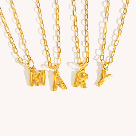 Personalized gold initial necklace with 3D letter pendant. Stainless steel, A-Z available. Perfect for everyday elegance & meaningful gifts.