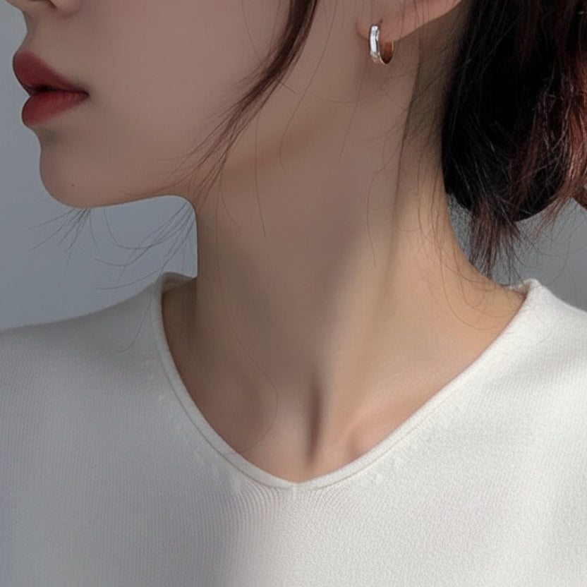 Delicate rose gold hoop earrings with high-shine finish. Lightweight, stackable design. Perfect for everyday elegance & minimalist style.