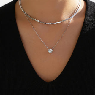 Elegant silver-plated double-layer necklace. Lightweight, delicate chains. Perfect for layering over sweaters & everyday elegance.